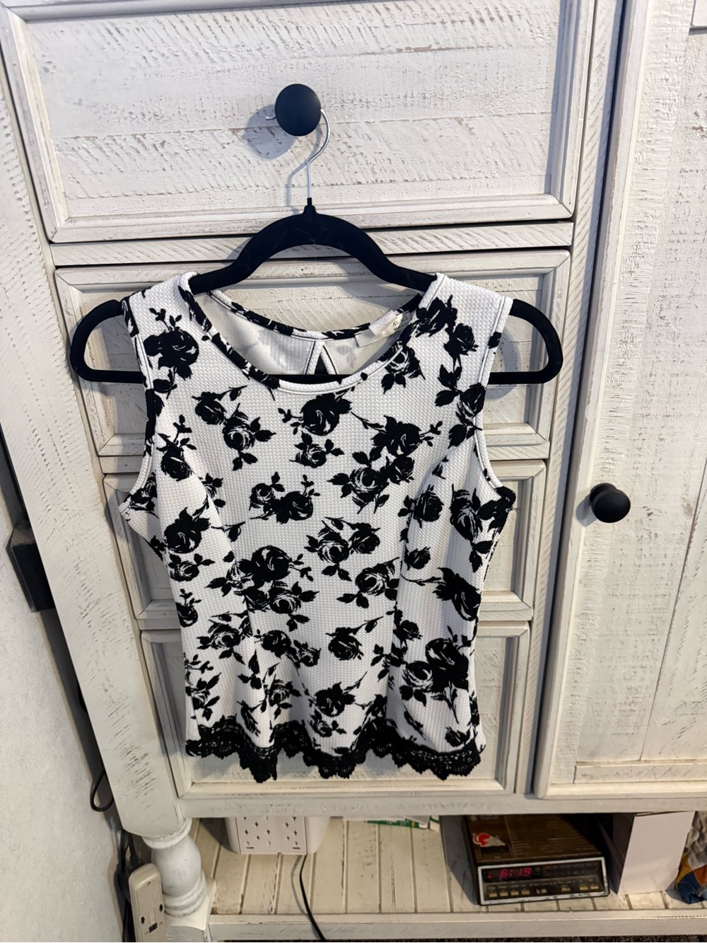 a'gaci White Sleeveless Camisole with Black Floral Print and Lace Hem